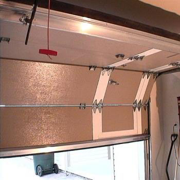 Open garage door with pass-through door