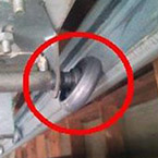 Misaligned garage door rollers